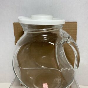 Vintage clear, glass picture jug made in Italy with white plastic lid
